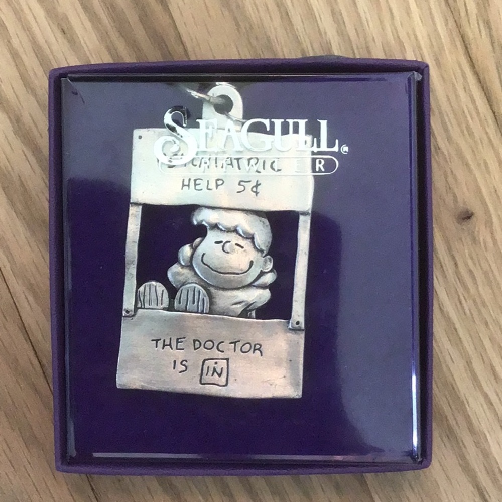 Seagull -Pewter Lucy from peanuts keychain. New in box.